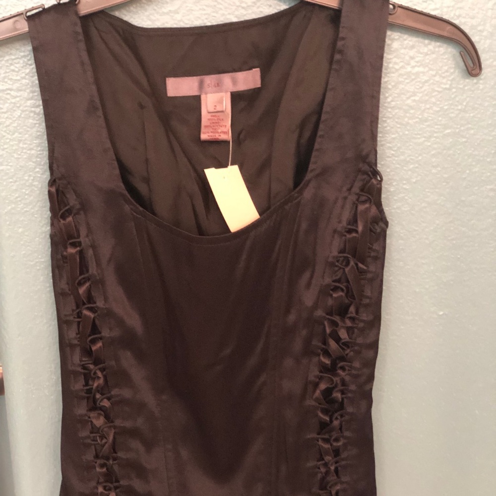 Adorable black camisole shirt that pulls you in